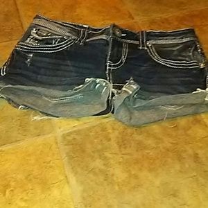Amethyst little distressed jean shorts.